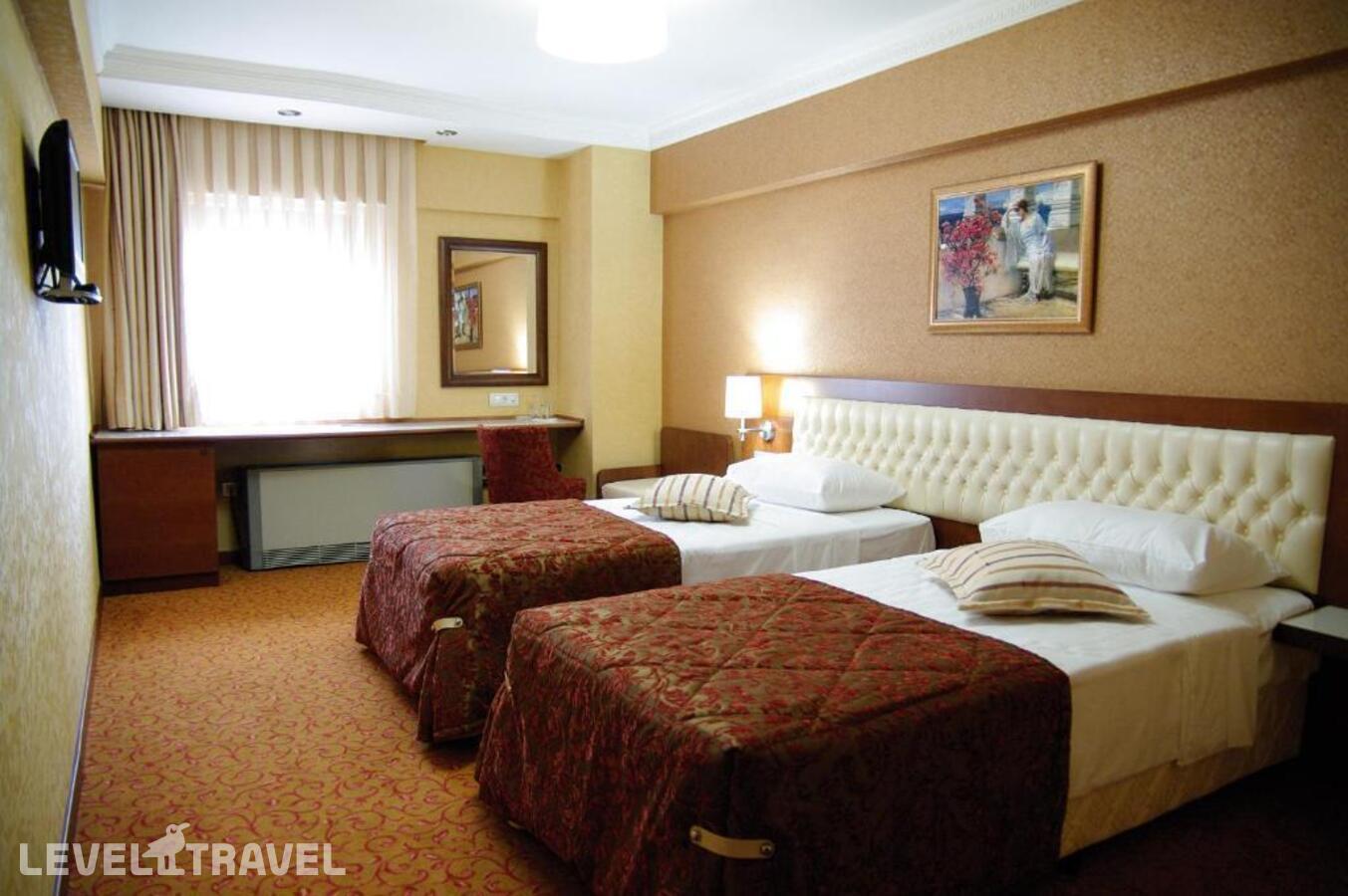 фотографии номера Стандартный (две односпальные кровати) отеля Yuksel Hotel в Турция(Фатих) - фото №8