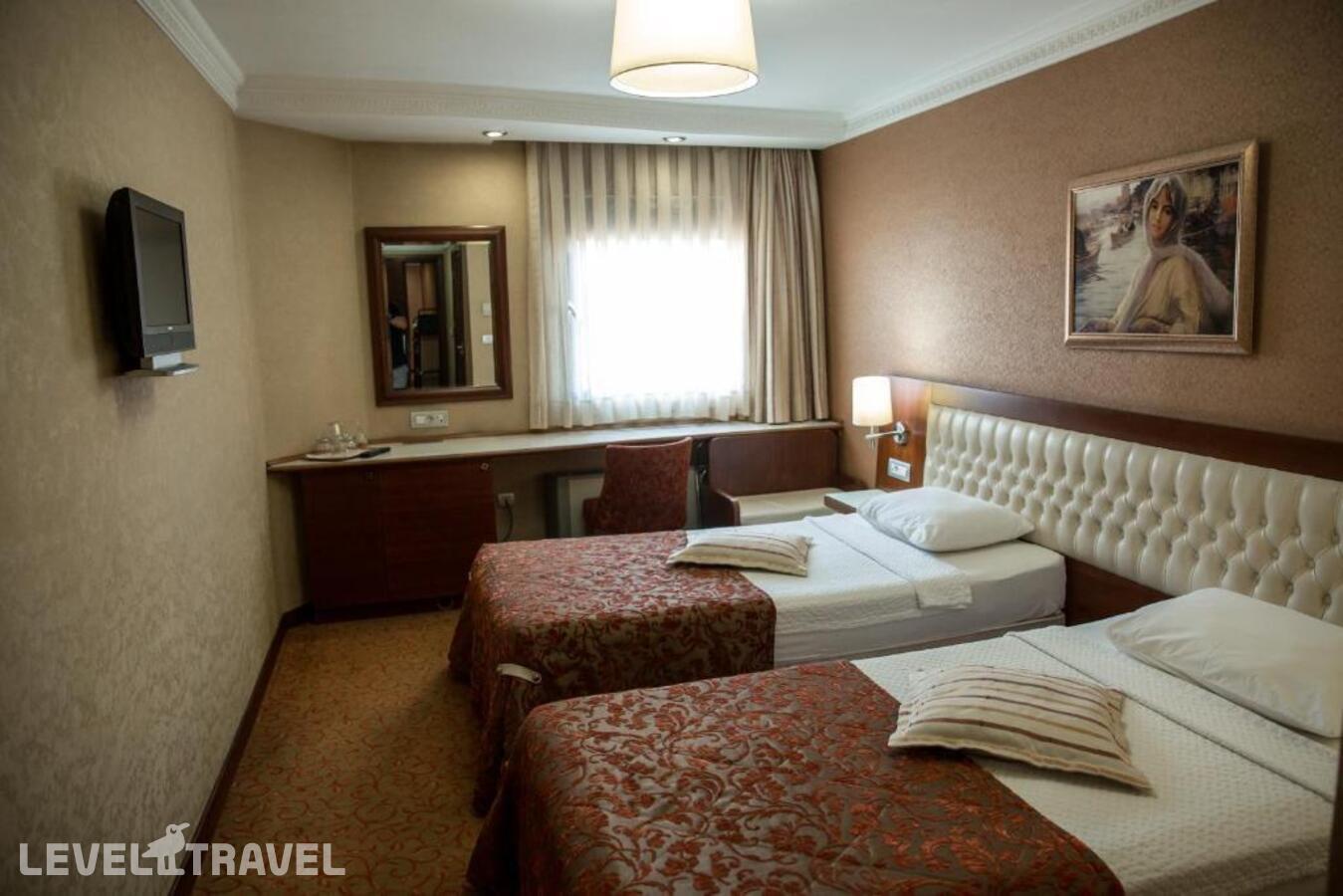 фотографии номера Стандартный (две односпальные кровати) отеля Yuksel Hotel в Турция(Фатих) - фото №3
