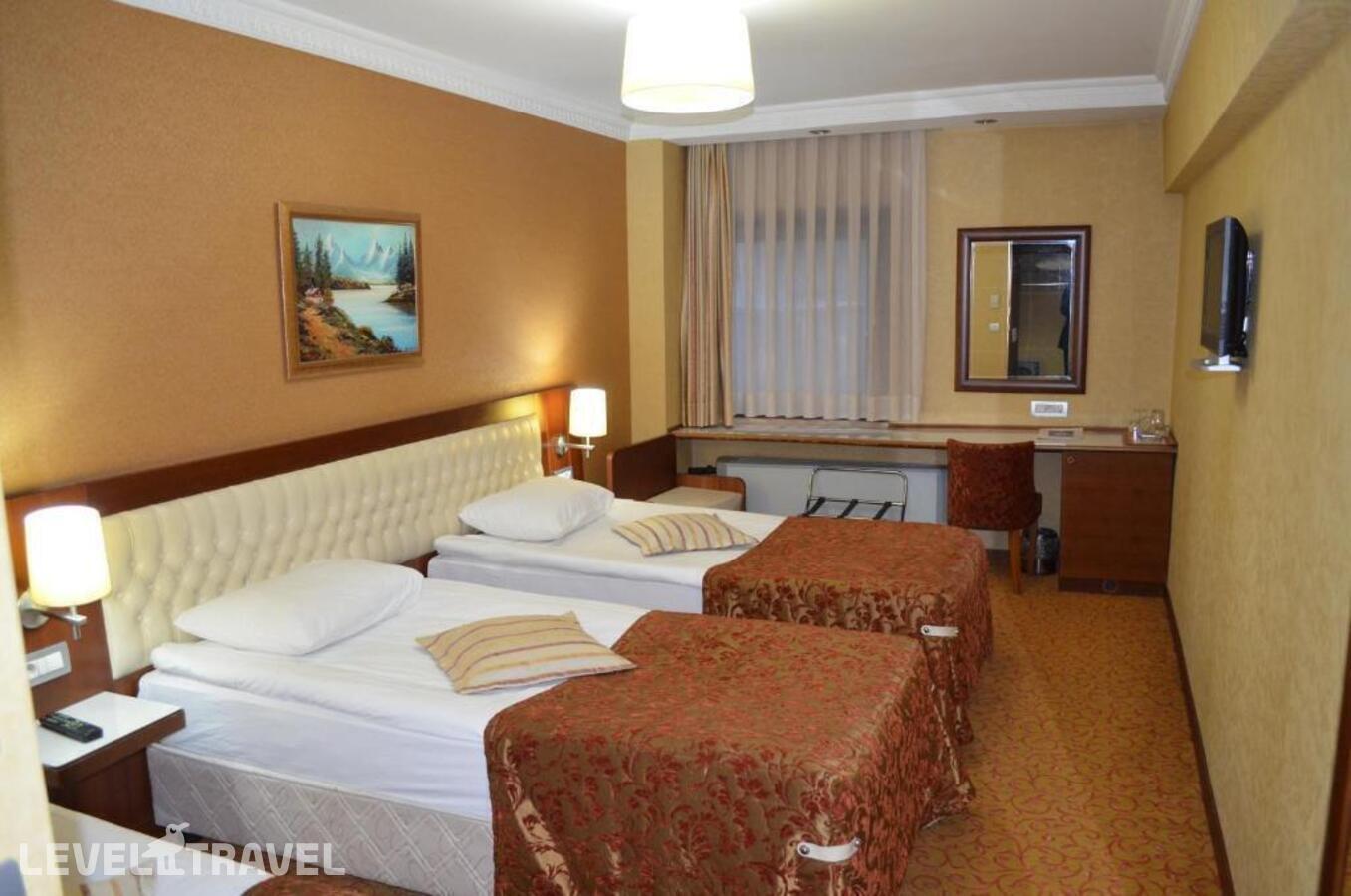 фотографии номера Стандартный (две односпальные кровати) отеля Yuksel Hotel в Турция(Фатих) - фото №15
