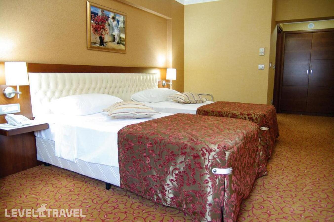 фотографии номера Стандартный (две односпальные кровати) отеля Yuksel Hotel в Турция(Фатих) - фото №9