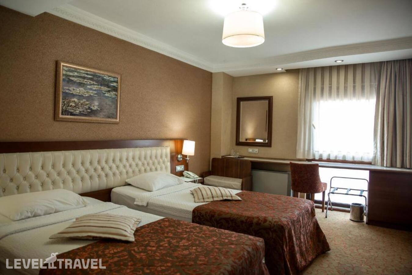 фотографии номера Стандартный (две односпальные кровати) отеля Yuksel Hotel в Турция(Фатих) - фото №7