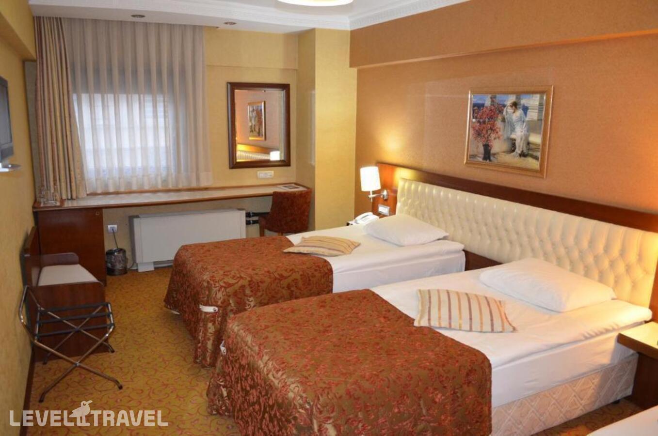 фотографии номера Стандартный (две односпальные кровати) отеля Yuksel Hotel в Турция(Фатих) - фото №13