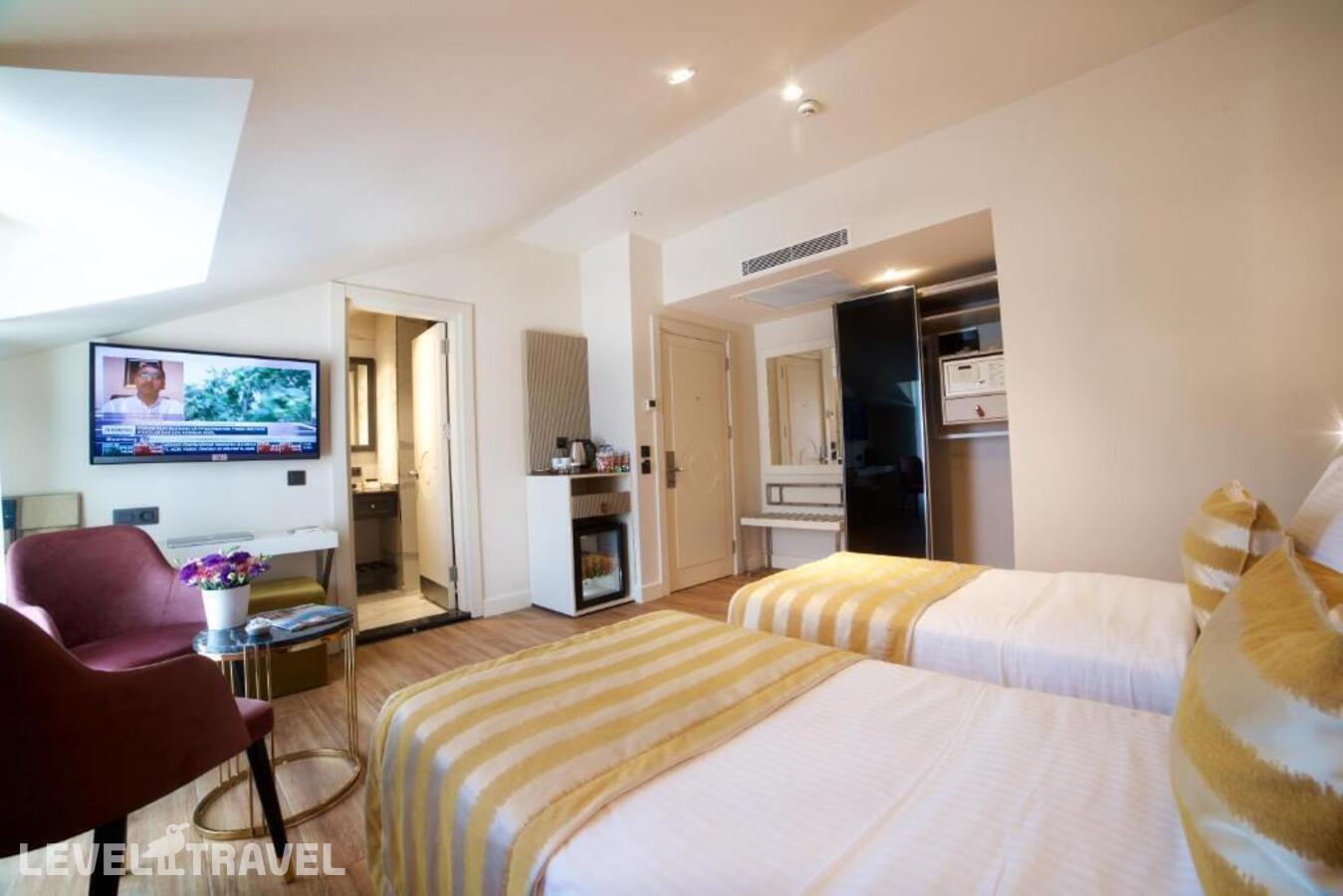фотографии номера Делюкс (две односпальные кровати) отеля Icon Hotel в Турция(Шишли) - фото №3