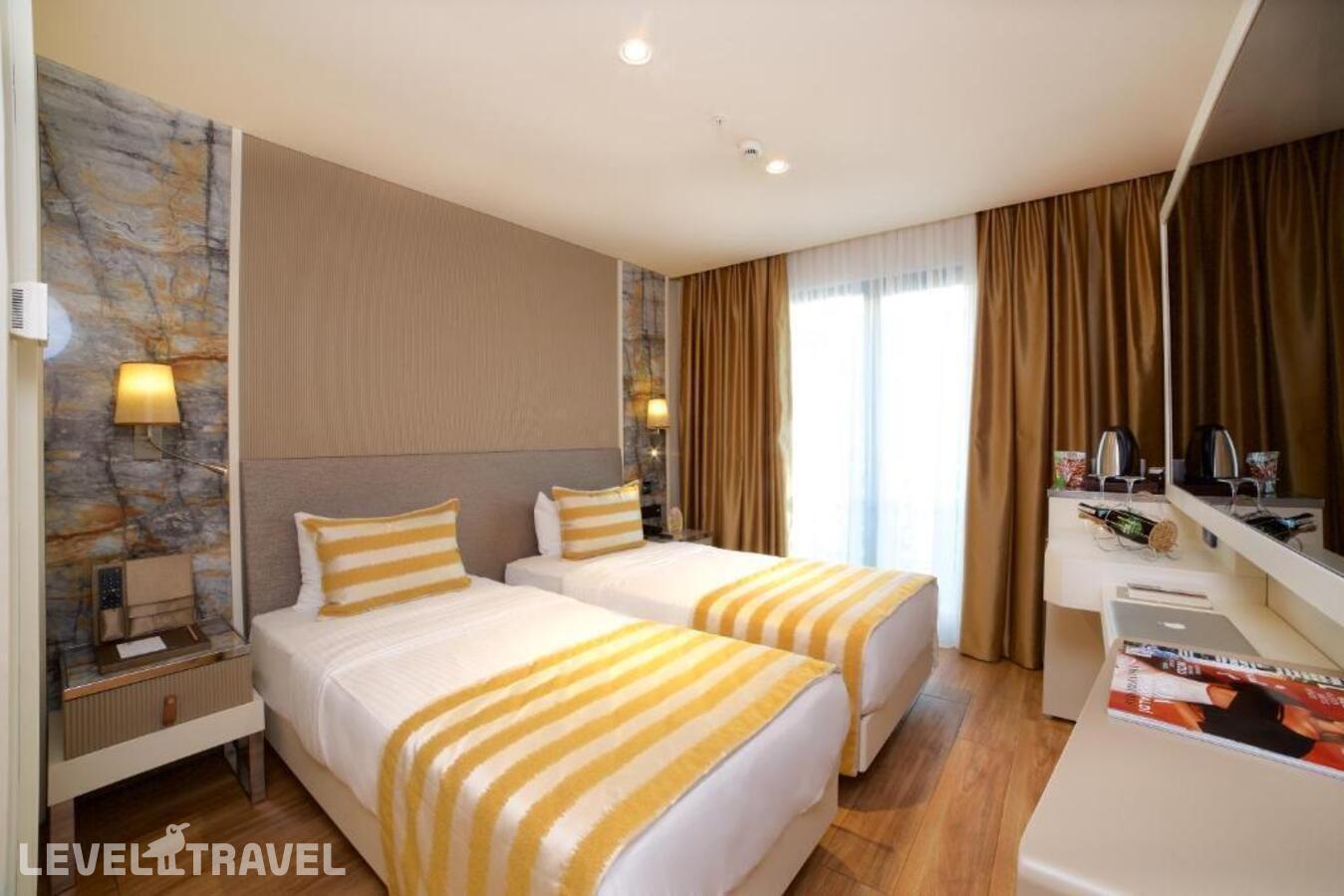фотографии номера Делюкс (две односпальные кровати) отеля Icon Hotel в Турция(Шишли) - фото №2