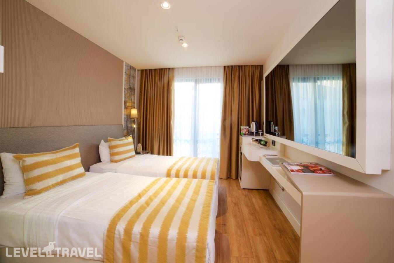 фотографии номера Делюкс (две односпальные кровати) отеля Icon Hotel в Турция(Шишли) - фото №1