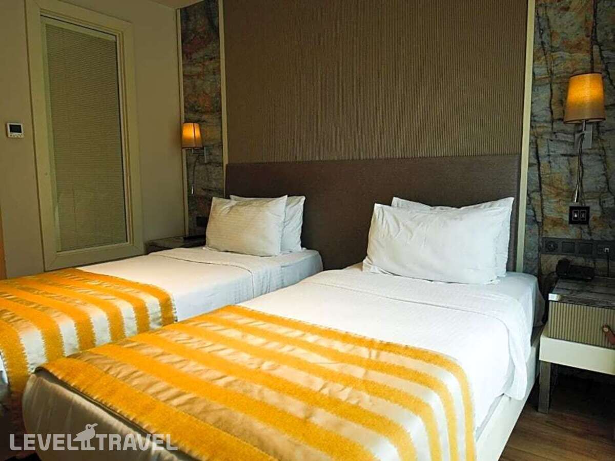 фотографии номера Улучшенный (две односпальные кровати) отеля Icon Hotel в Турция(Шишли) - фото №2