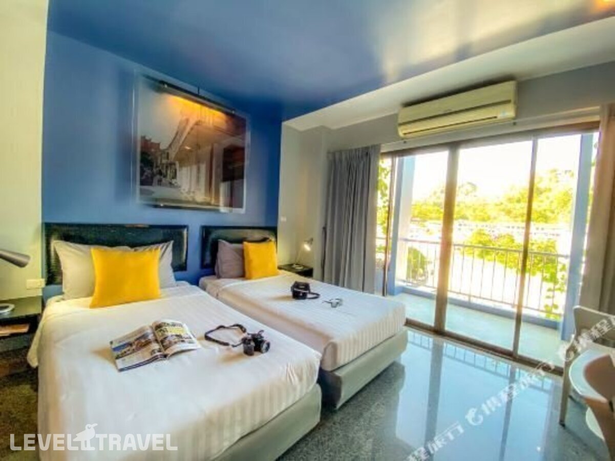 фотографии номера Улучшенный номер отеля Sino Inn Phuket Hotel в Таиланд(город Пхукет) - фото №13