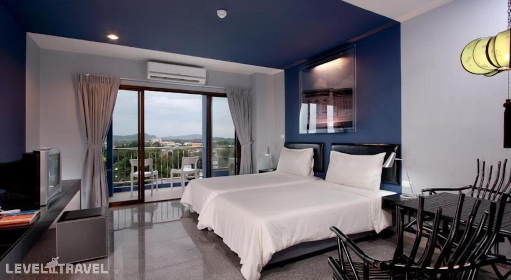 фотографии номера Улучшенный номер отеля Sino Inn Phuket Hotel в Таиланд(город Пхукет) - фото №1