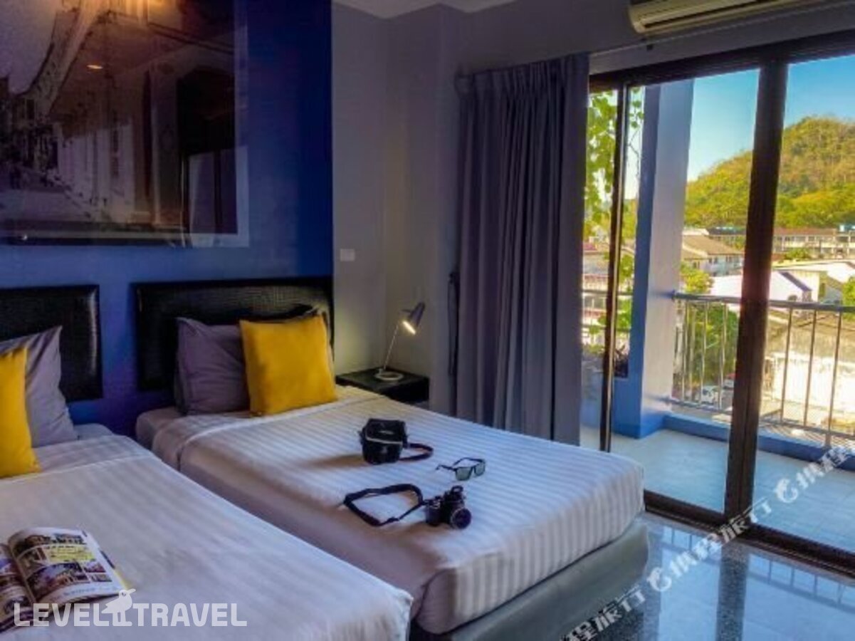 фотографии номера Улучшенный номер отеля Sino Inn Phuket Hotel в Таиланд(город Пхукет) - фото №10