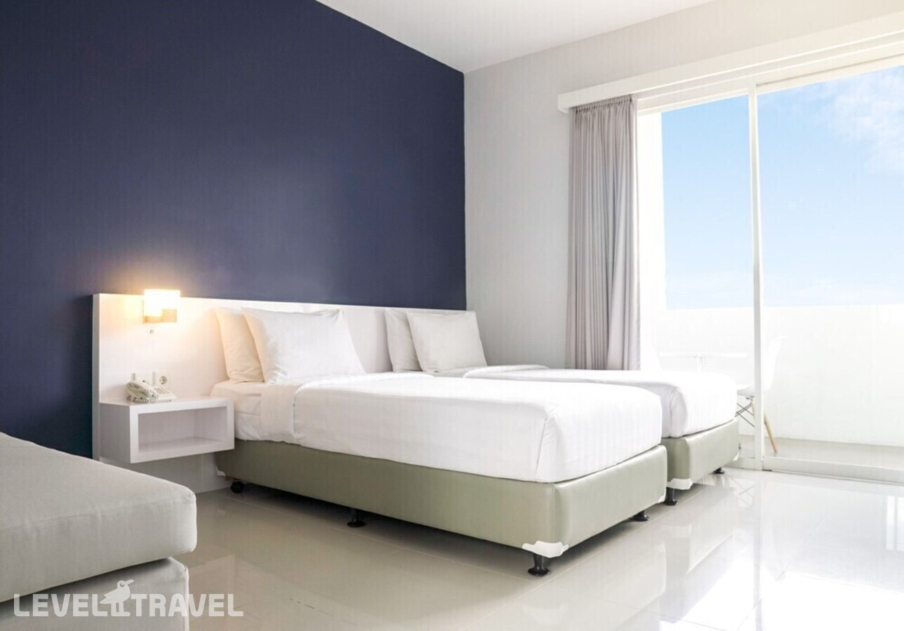фотографии номера Стандартный (две односпальные кровати) отеля Cozy Stay Bali в Индонезия(Семиньяк) - фото №4