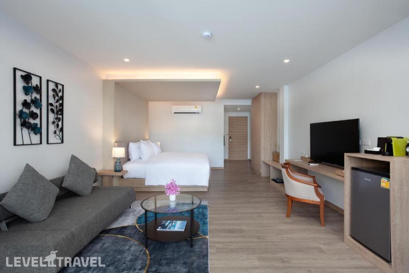 фотографии номера Делюкс с выходом к бассейну отеля Anona Beachfront Phuket Resort в Таиланд(Патонг Бич) - фото №7