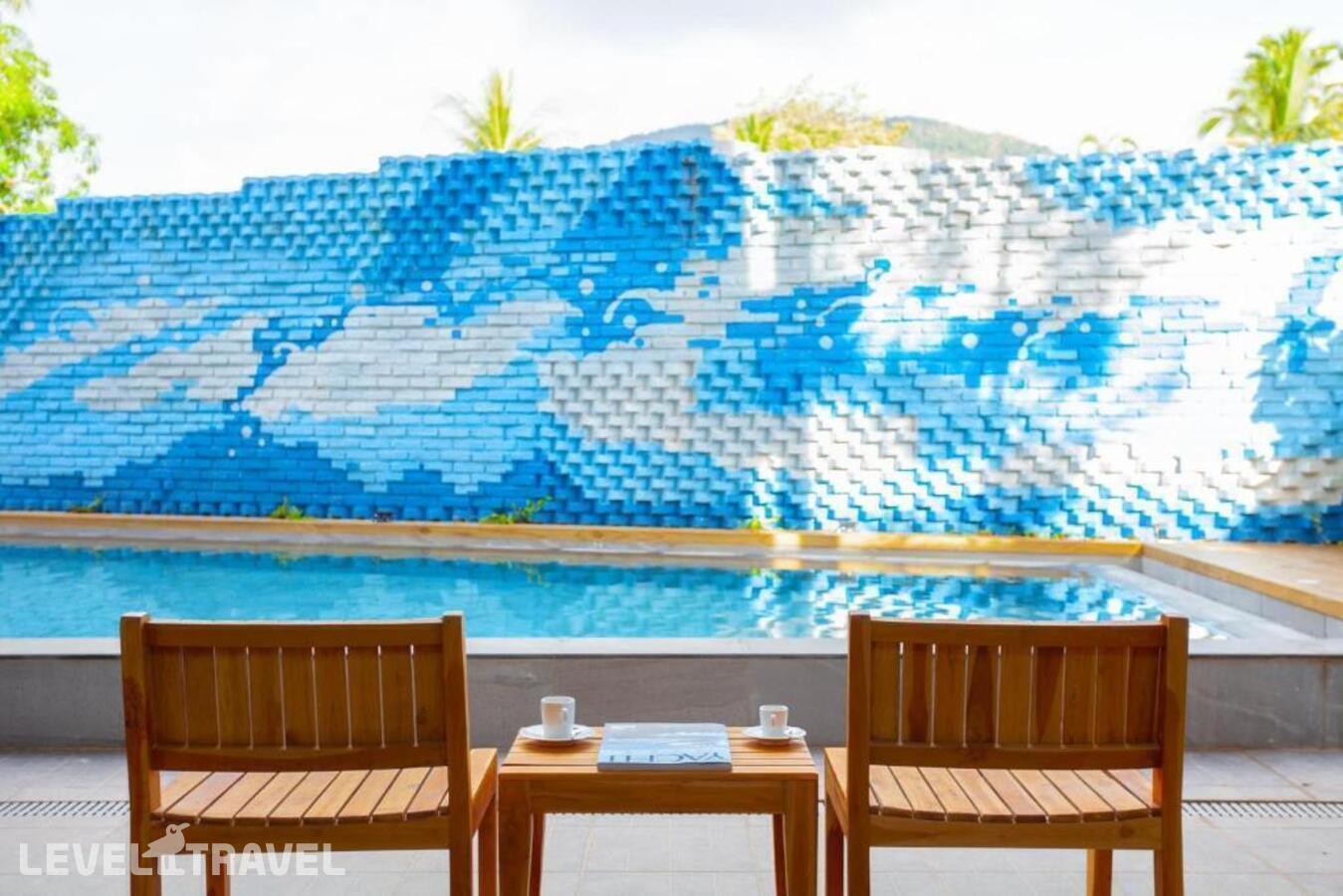 фотографии номера Делюкс с выходом к бассейну отеля Anona Beachfront Phuket Resort в Таиланд(Патонг Бич) - фото №3