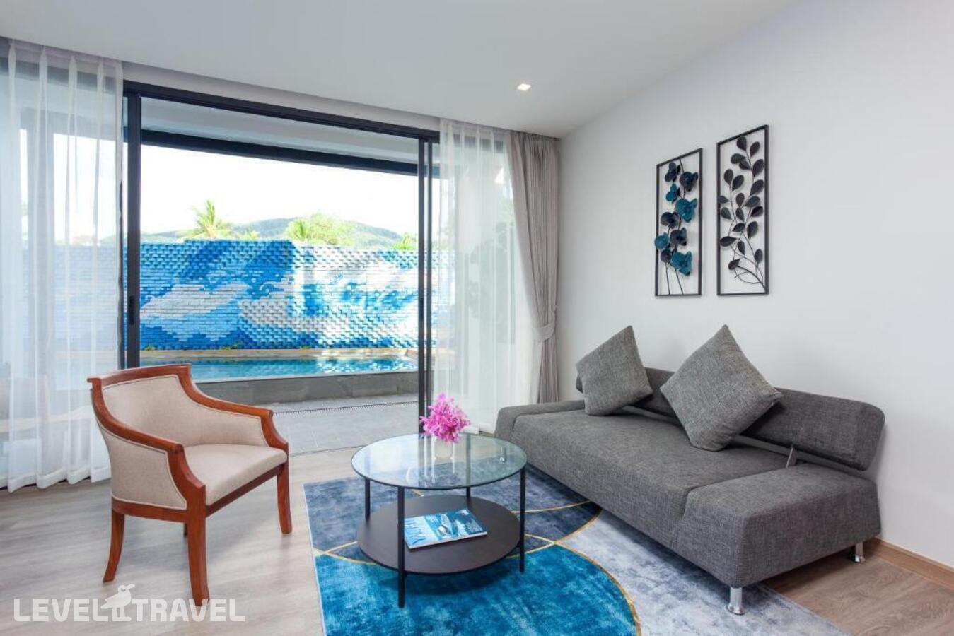фотографии номера Делюкс с выходом к бассейну отеля Anona Beachfront Phuket Resort в Таиланд(Патонг Бич) - фото №2