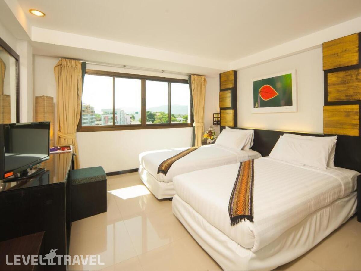 фотографии номера Стандартный (две односпальные кровати) отеля Crystal Inn Phuket в Таиланд(город Пхукет) - фото №1