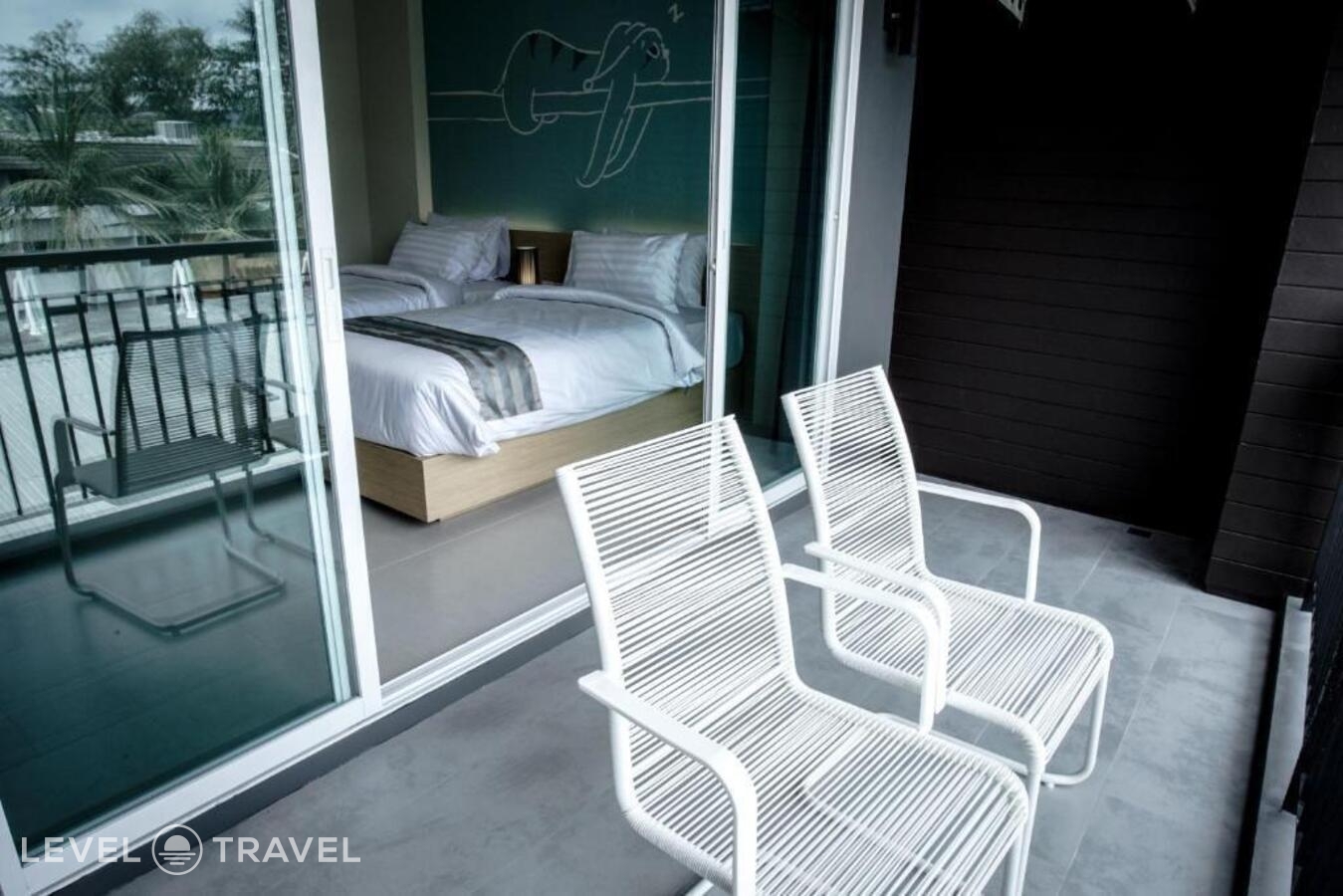 фотографии номера Делюкс (две односпальные кровати) отеля Tiras Patong Beach Hotel в Таиланд(Патонг Бич) - фото №4