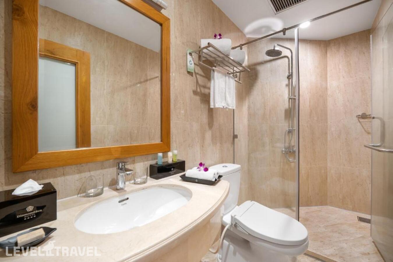 фотографии номера Улучшенный (две односпальные кровати) отеля Diamond Sea Hotel в Вьетнам(Дананг) - фото №5