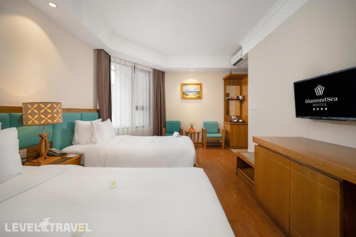 фотографии номера Улучшенный (две односпальные кровати) отеля Diamond Sea Hotel в Вьетнам(Дананг) - фото №3
