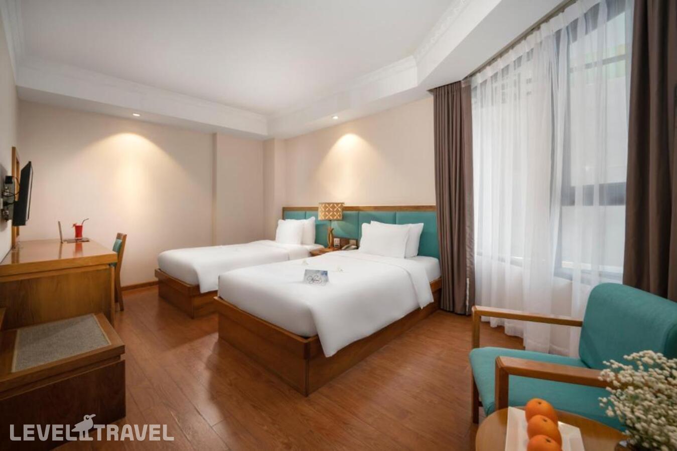 фотографии номера Улучшенный (две односпальные кровати) отеля Diamond Sea Hotel в Вьетнам(Дананг) - фото №2