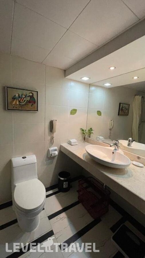 фотографии номера Делюкс (две односпальные кровати) отеля Canton Hotel в Китай(Гуанчжоу) - фото №3