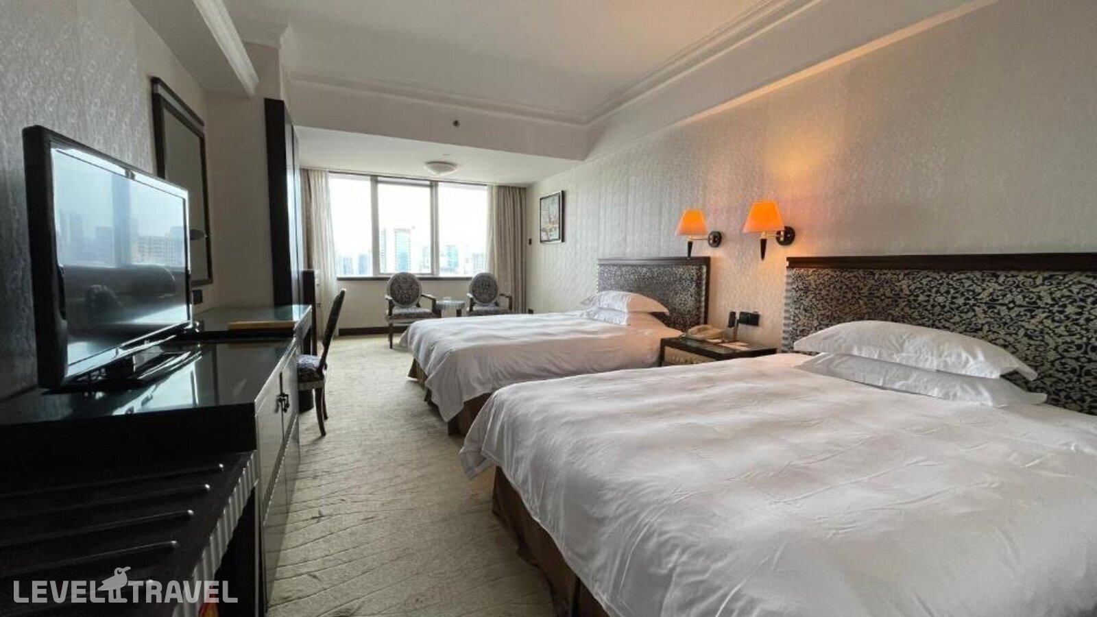 фотографии номера Делюкс (две односпальные кровати) отеля Canton Hotel в Китай(Гуанчжоу) - фото №2
