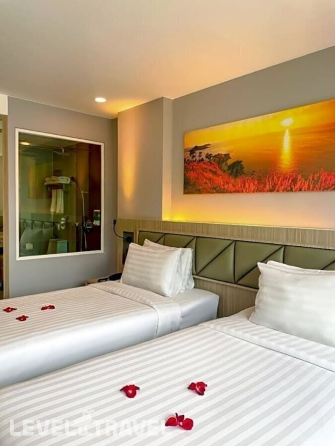 фотографии номера Делюкс (две односпальные кровати) отеля Clarion Hotel Patong (Ex.Araya Patong Beach Hotel) в Таиланд(Патонг Бич) - фото №2