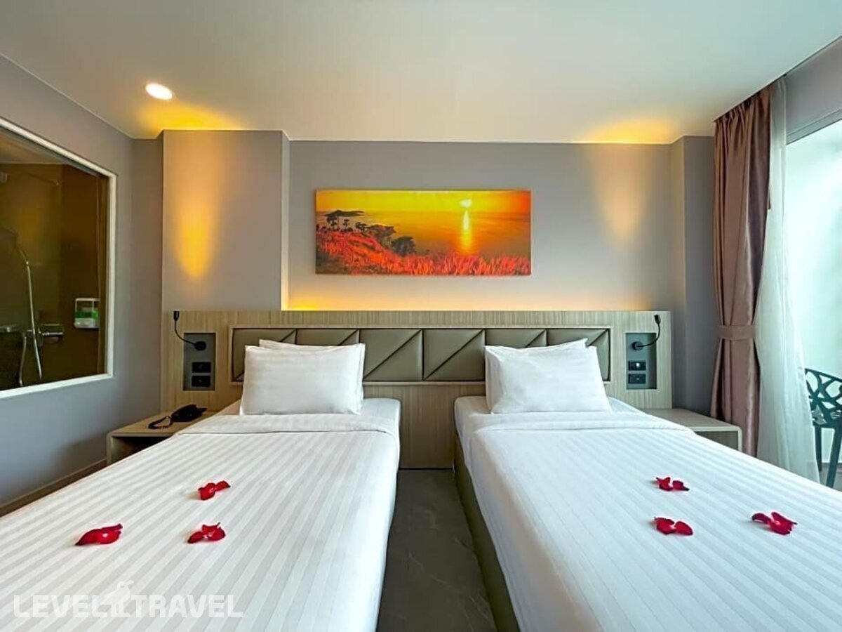 фотографии номера Делюкс (две односпальные кровати) отеля Clarion Hotel Patong (Ex.Araya Patong Beach Hotel) в Таиланд(Патонг Бич) - фото №1