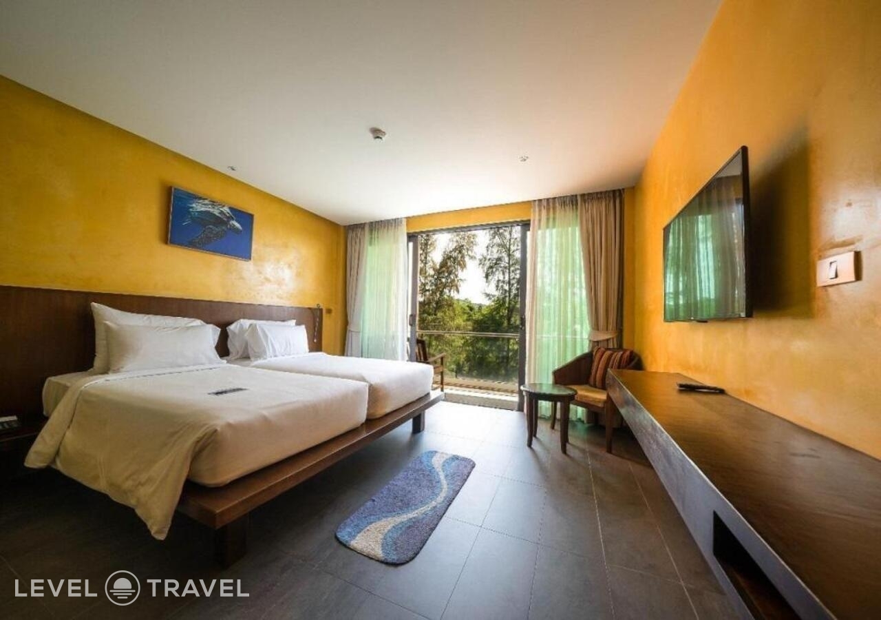 фотографии номера Делюкс (две односпальные кровати) отеля Coriacea Boutique Resort в Таиланд(Май Као Бич) - фото №2