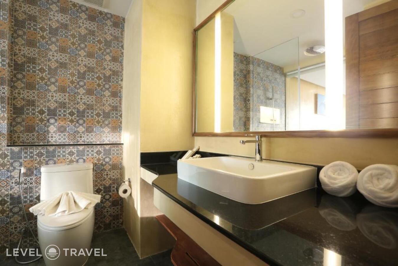 фотографии номера Делюкс с видом на море (две односпальные кровати) отеля Coriacea Boutique Resort в Таиланд(Май Као Бич) - фото №7