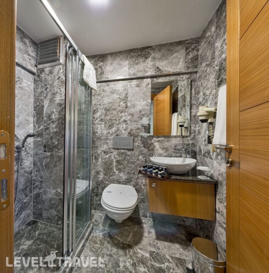 фотографии номера Стандартный (две односпальные кровати) отеля Bergama Hotel в Турция(Фатих) - фото №1