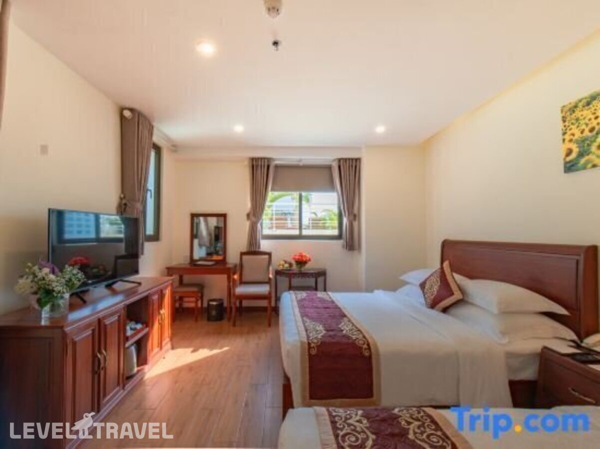 фотографии номера Улучшенный (две односпальные кровати) отеля Red Sun Nha Trang Hotel в Вьетнам(Нячанг) - фото №5