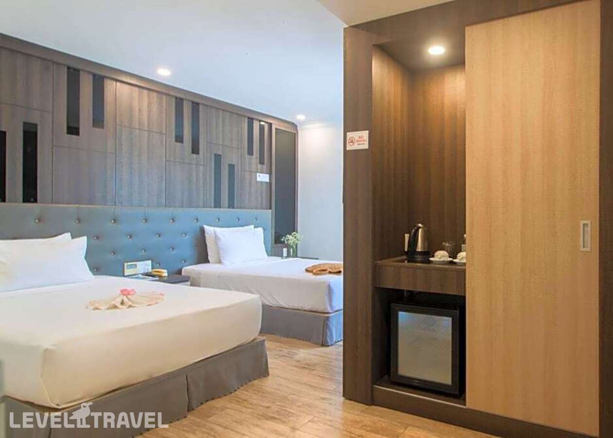 фотографии номера Улучшенный (две односпальные кровати) отеля Seven Seas Hotel Nha Trang в Вьетнам(Нячанг) - фото №2