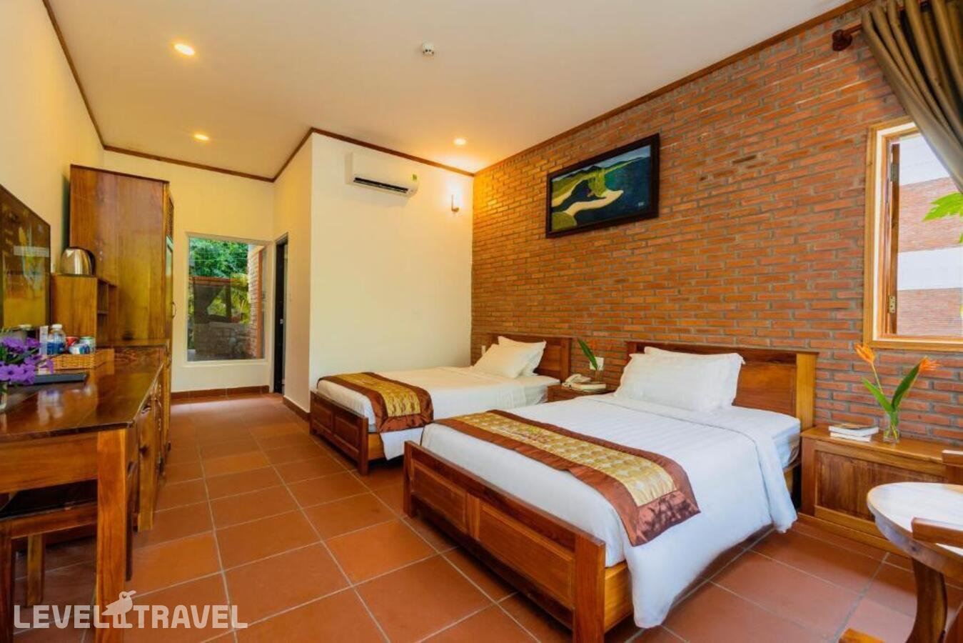 фотографии номера Делюкс с видом на сад (две односпальные кровати) отеля The Garden House Phu Quoc в Вьетнам(Фукуок) - фото №21