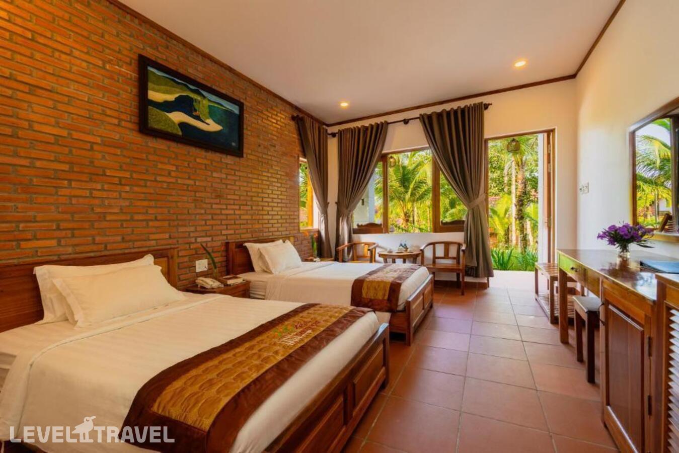 фотографии номера Делюкс с видом на сад (две односпальные кровати) отеля The Garden House Phu Quoc в Вьетнам(Фукуок) - фото №26