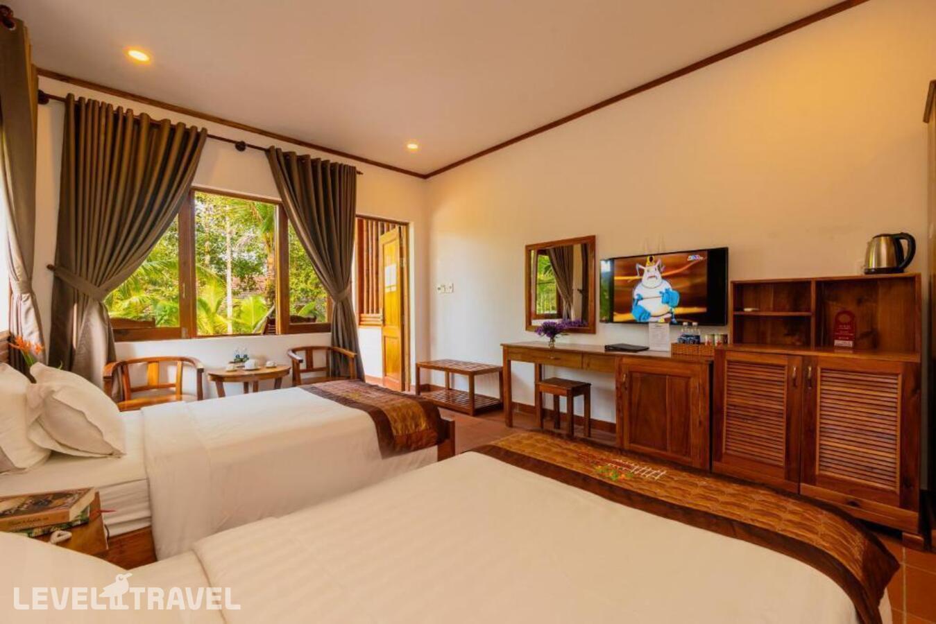 фотографии номера Делюкс с видом на сад (две односпальные кровати) отеля The Garden House Phu Quoc в Вьетнам(Фукуок) - фото №29