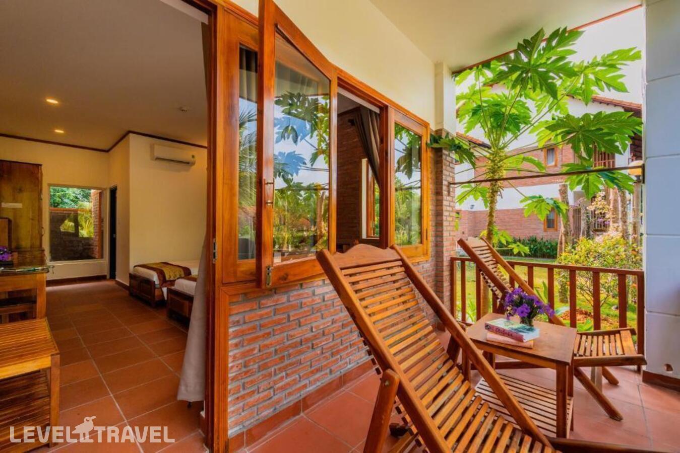 фотографии номера Делюкс с видом на сад (две односпальные кровати) отеля The Garden House Phu Quoc в Вьетнам(Фукуок) - фото №28