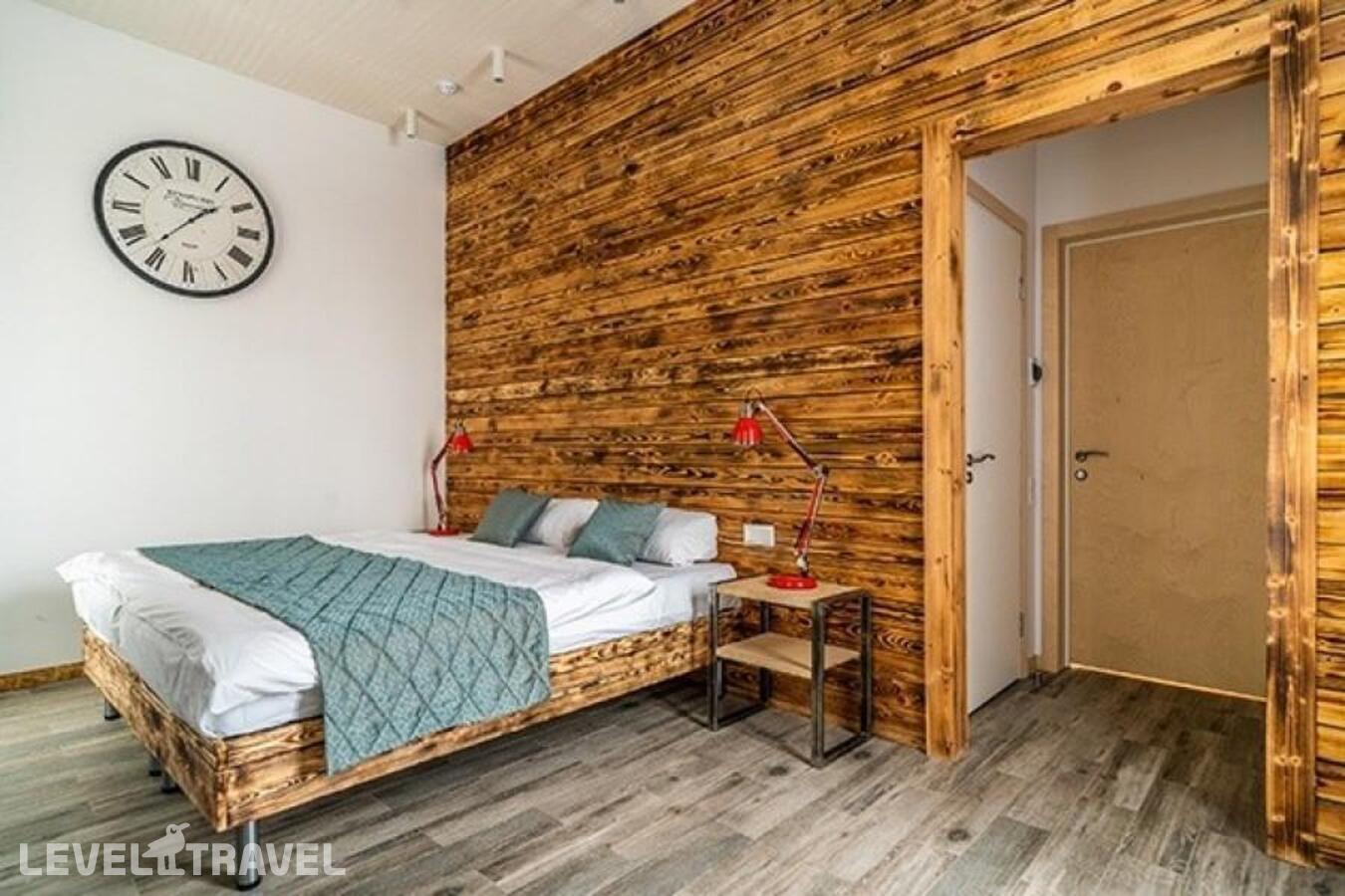 фотографии номера Делюкс (двуспальная кровать и две односпальные) отеля Loft Garden в Россия(Центральный район) - фото №2