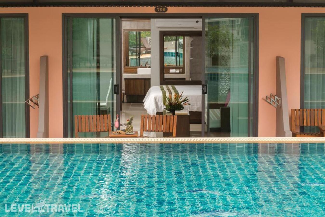 фотографии номера Делюкс (две односпальные кровати) отеля Naina Resort & Spa в Таиланд(Патонг Бич) - фото №20