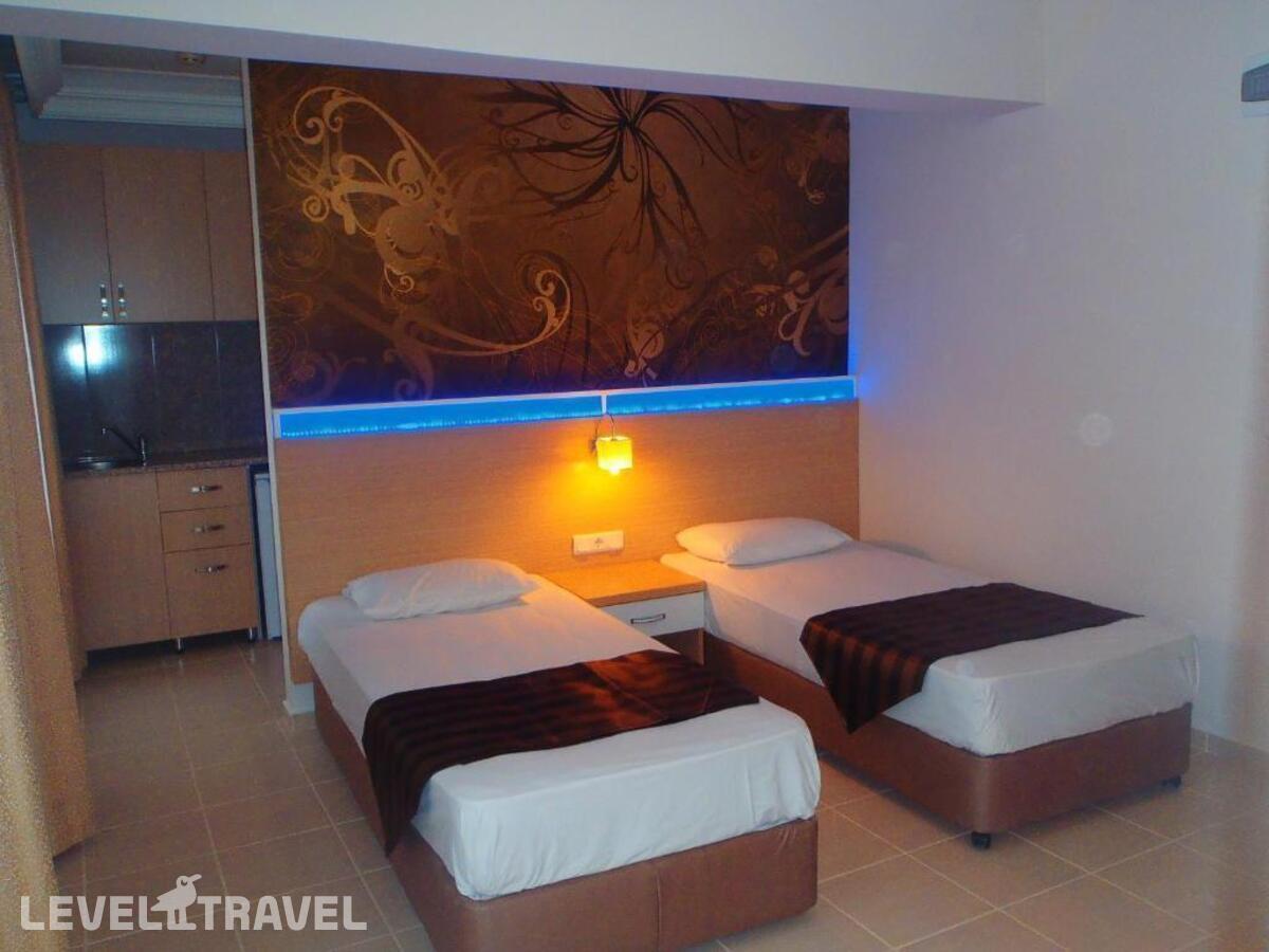 фотографии номера Стандартный (две односпальные кровати) отеля Bora Bora Butik Hotel в Турция(Тосмур) - фото №2