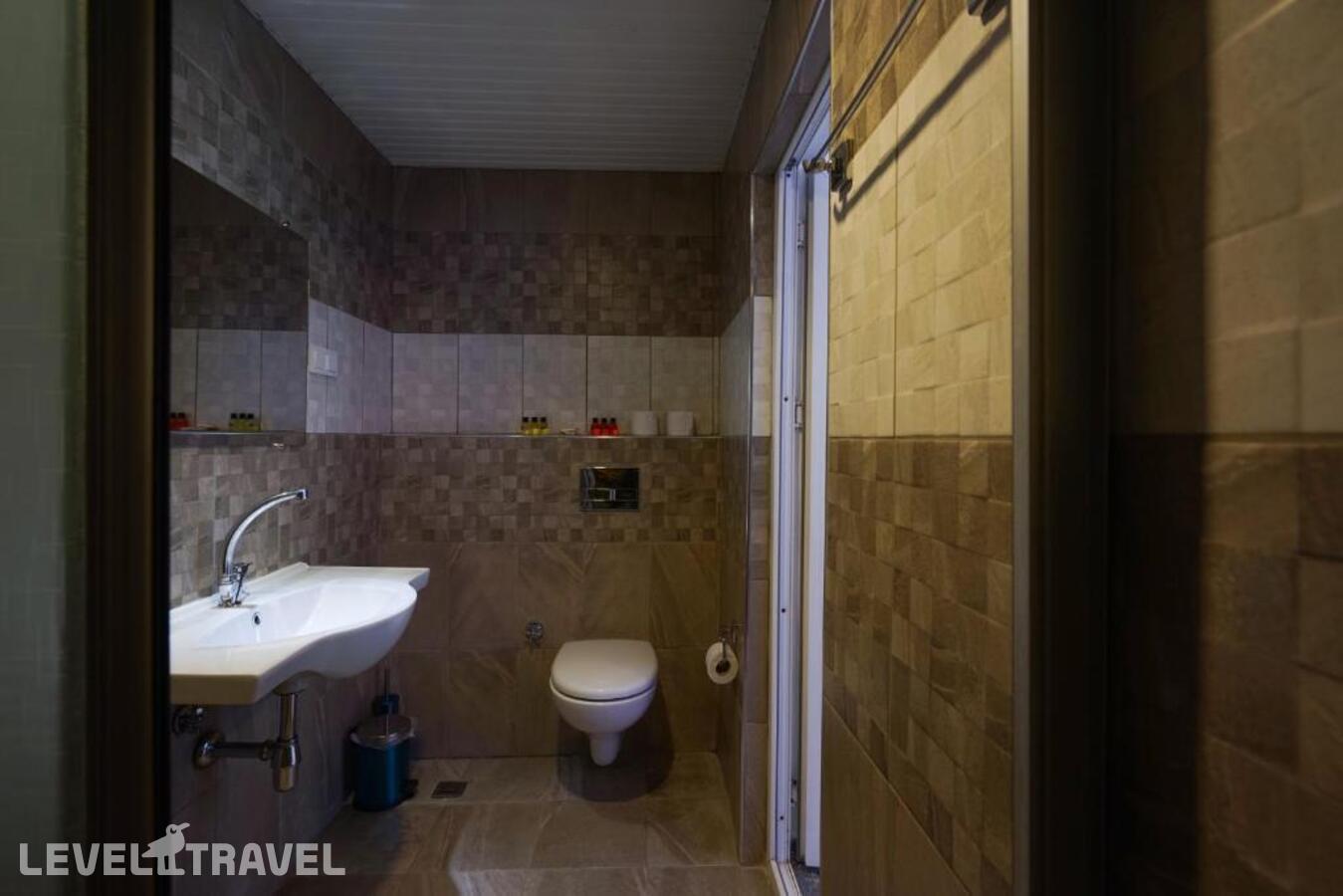 фотографии номера Стандартный (две односпальные кровати) отеля Bora Bora Butik Hotel в Турция(Тосмур) - фото №4