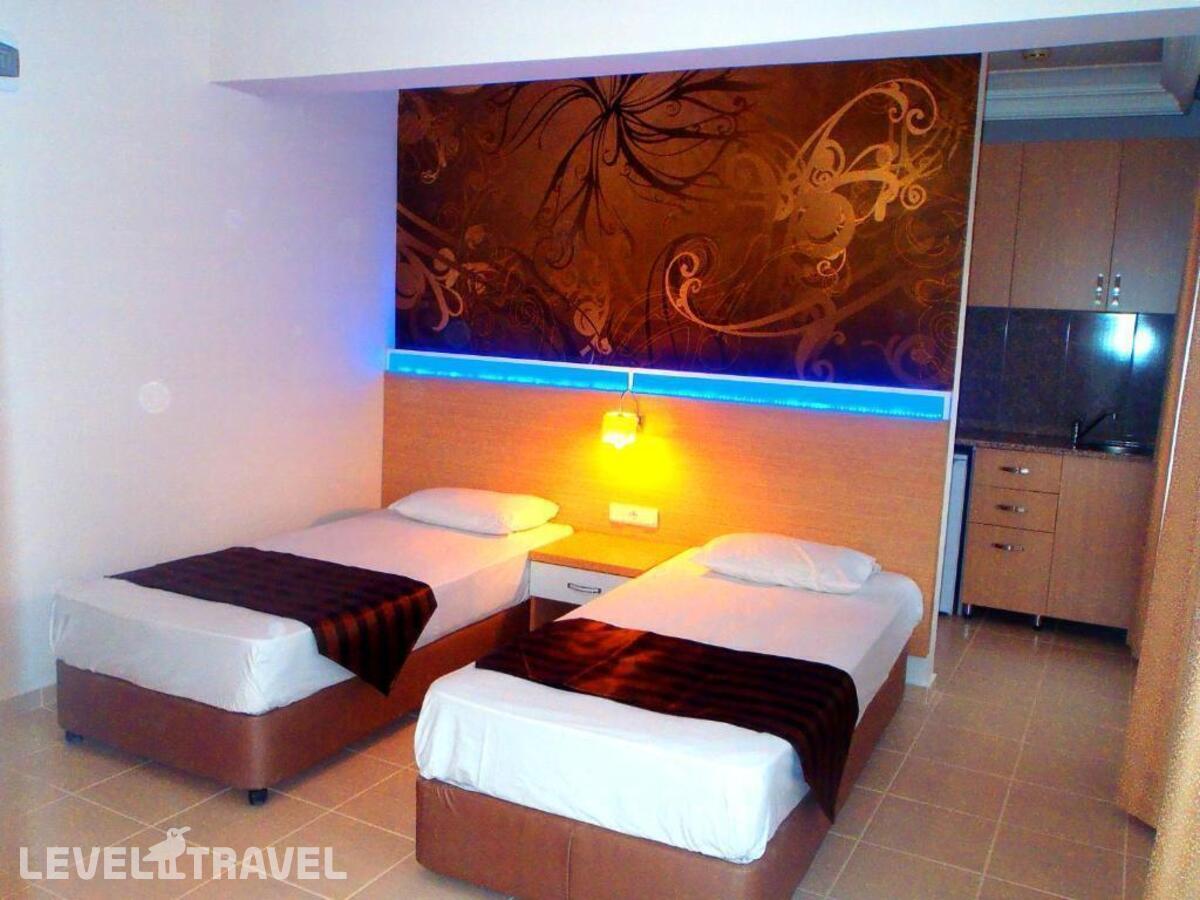 фотографии номера Стандартный (две односпальные кровати) отеля Bora Bora Butik Hotel в Турция(Тосмур) - фото №1
