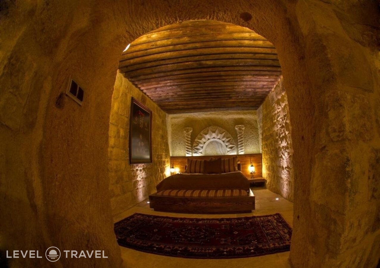 фотографии номера Стандартный (две односпальные кровати) отеля Kayakapi Premium Caves Cappadocia Hotel в Турция(Ургюп) - фото №2