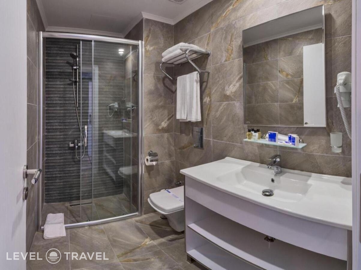 фотографии номера Стандартный (две односпальные кровати) отеля Inntel Hotel Istanbul в Турция(Таксим) - фото №1