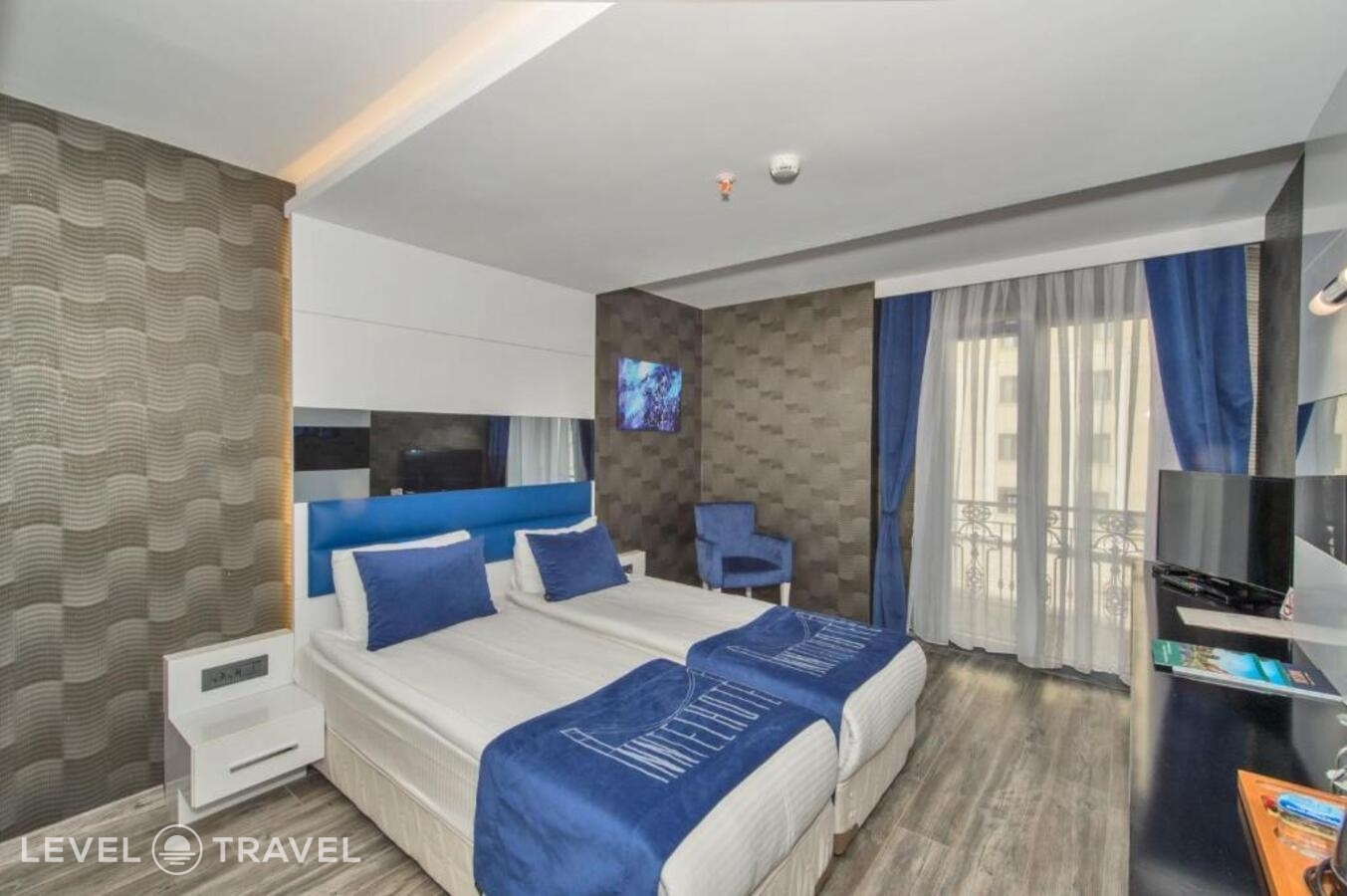 фотографии номера Стандартный (две односпальные кровати) отеля Inntel Hotel Istanbul в Турция(Таксим) - фото №5