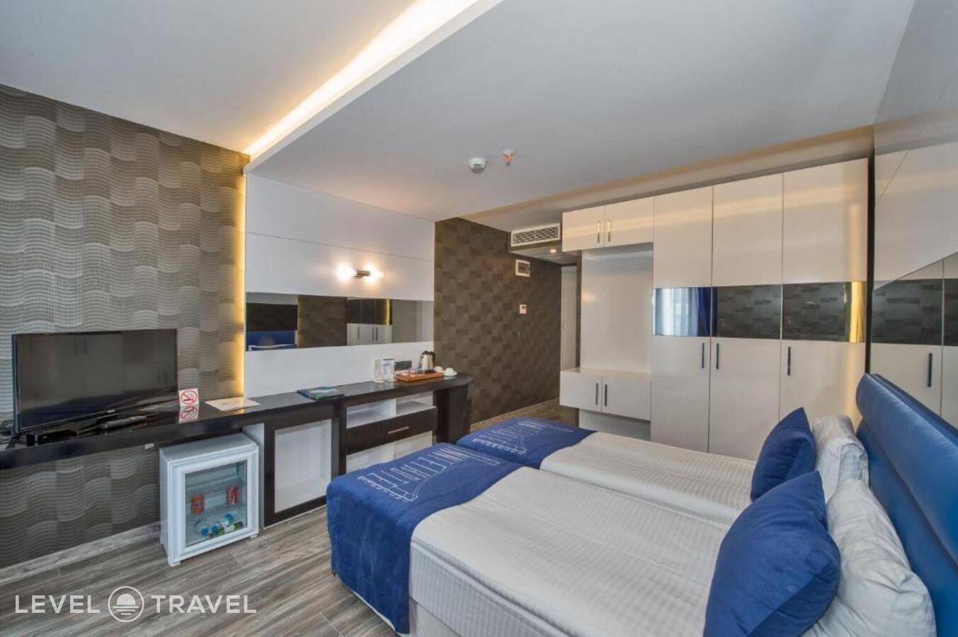 фотографии номера Стандартный (две односпальные кровати) отеля Inntel Hotel Istanbul в Турция(Таксим) - фото №6