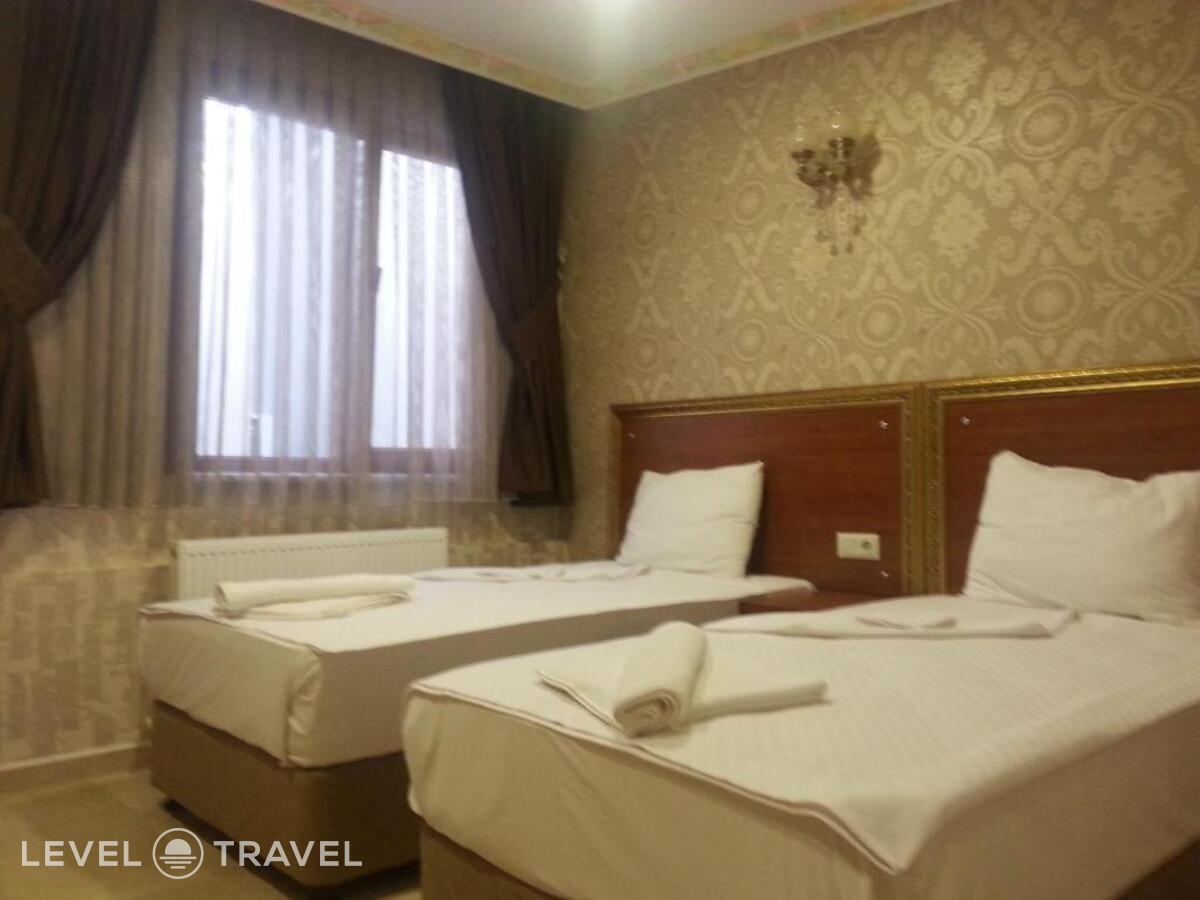 фотографии номера Стандартный (две односпальные кровати) отеля Rio Hotel в Турция(Лалели) - фото №3