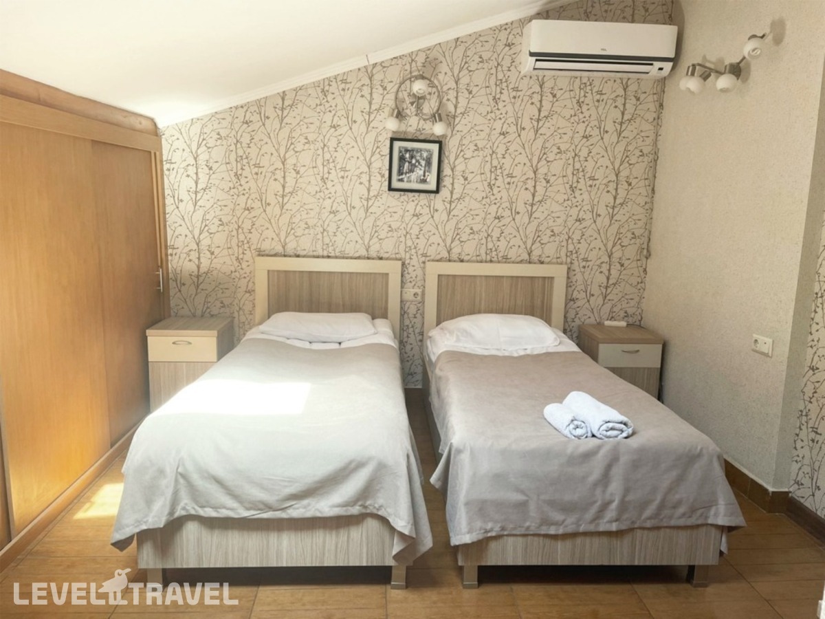 фотографии номера Экономичный (две односпальные кровати) отеля Tomas House в Грузия(Тбилиси) - фото №1
