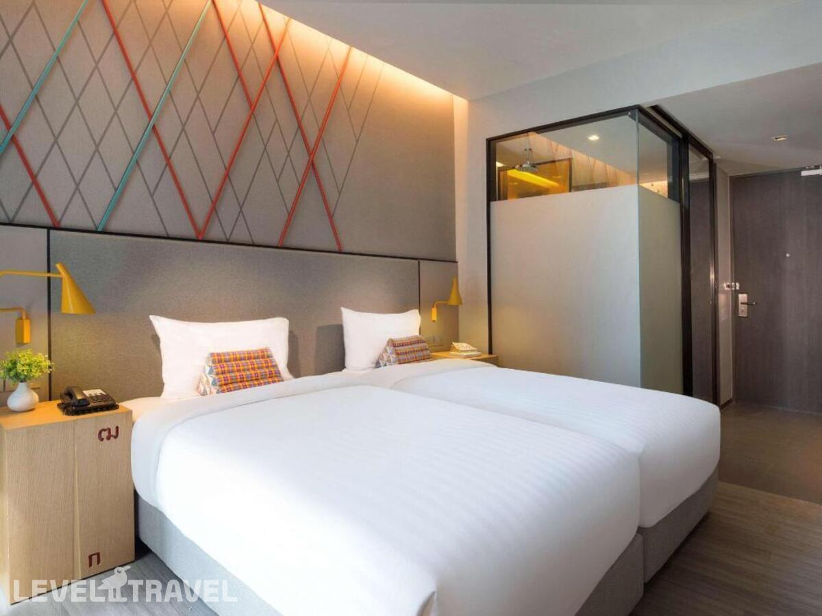 фотографии номера Стандартный (две односпальные кровати) отеля Ibis Styles Bangkok Sukhumvit Phra Khanong в Таиланд(Бангкок) - фото №1