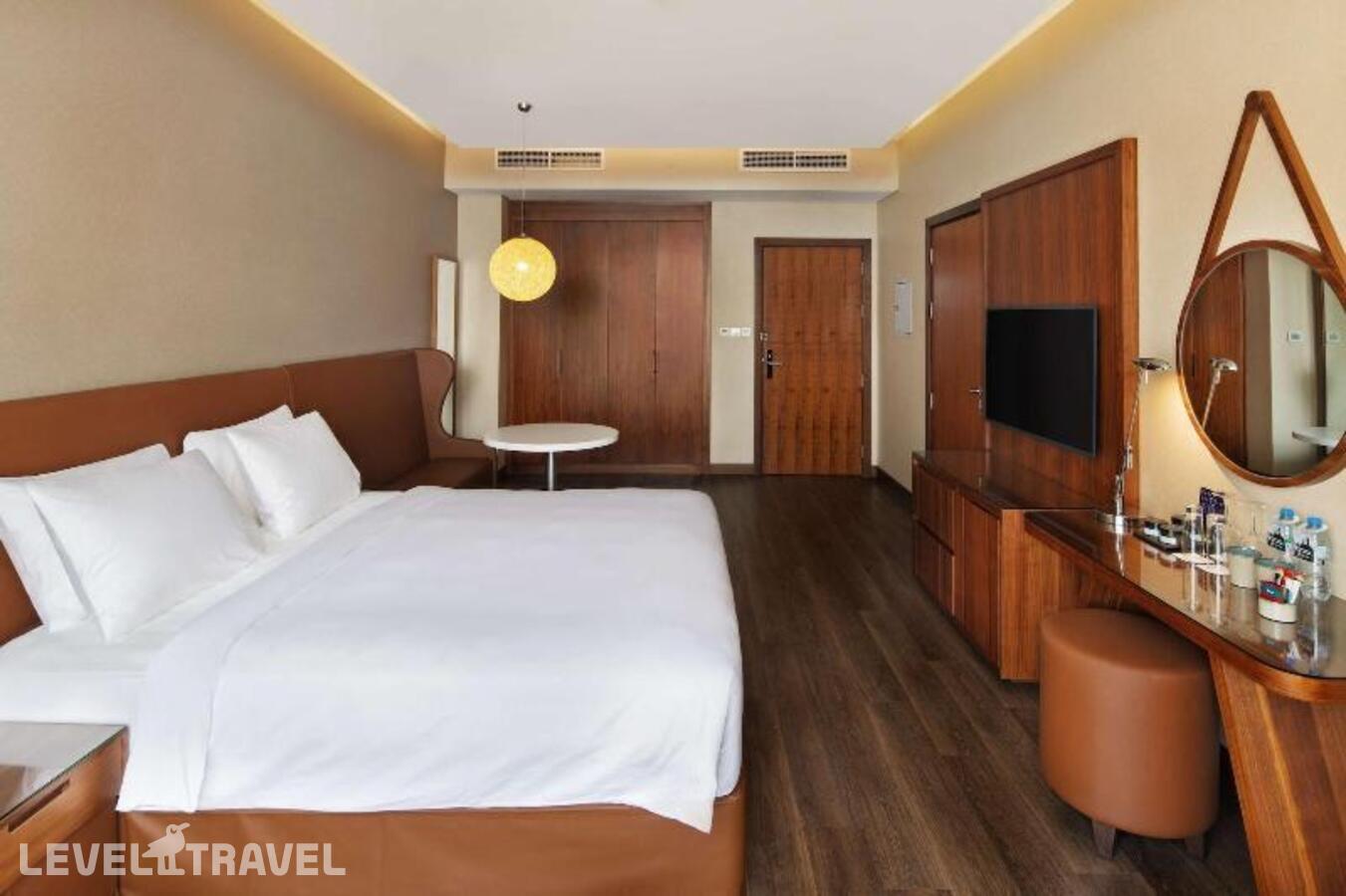 фотографии номера Улучшенный (две односпальные кровати) отеля Radisson Blu Dubai Canal View в ОАЭ(Бизнес Бей) - фото №7
