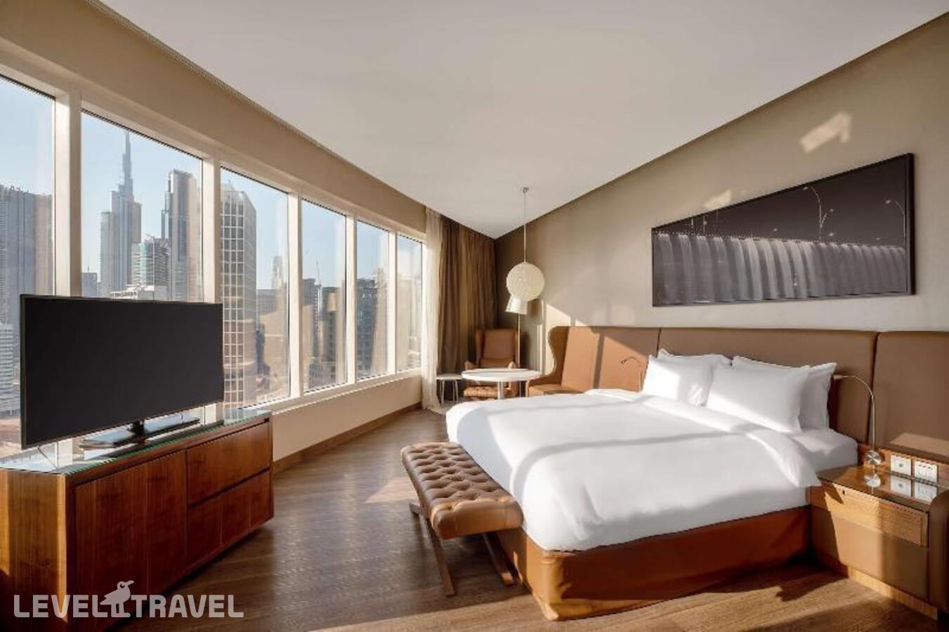 фотографии номера Улучшенный (две односпальные кровати) отеля Radisson Blu Dubai Canal View в ОАЭ(Бизнес Бей) - фото №5