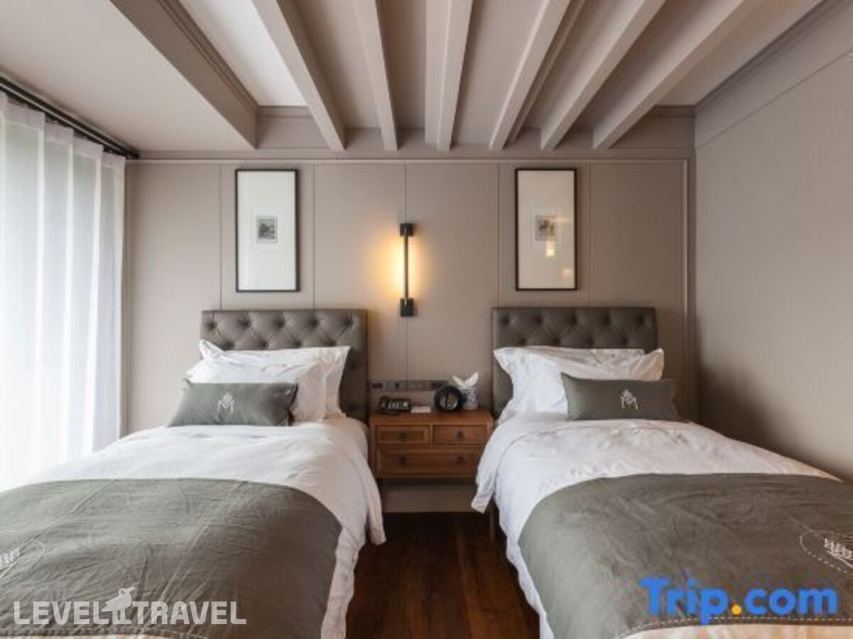 фотографии номера Улучшенный (две односпальные кровати) отеля Marine Beach Hotel Pattaya в Таиланд(Джомтьен) - фото №2